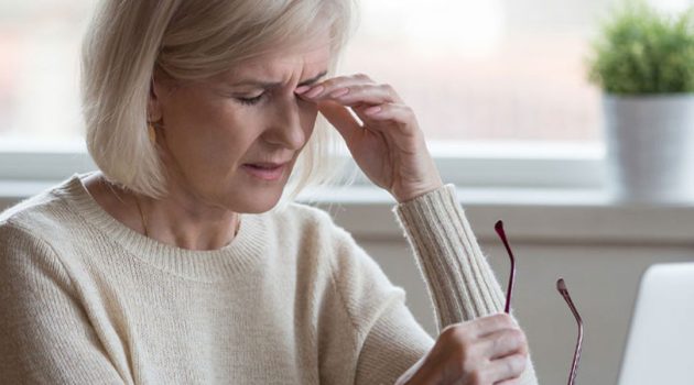 Blephartis lady rubbing her eyes